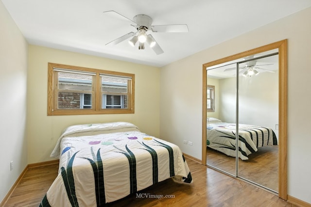 3219 N Pioneer Ave, Chicago, IL 60634 - bedroom with wood finished floors, a closet, and ceiling fan