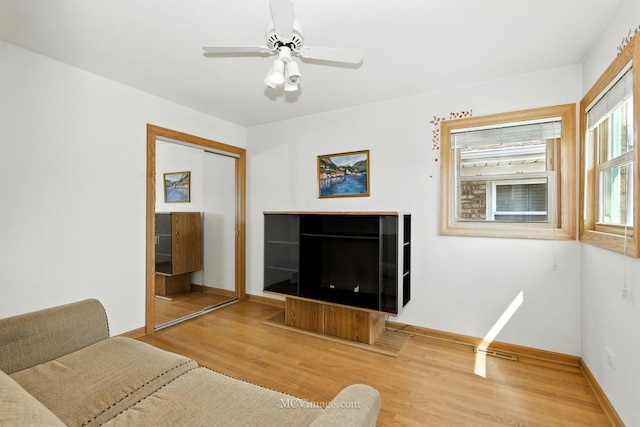 3219 N Pioneer Ave, Chicago, IL 60634 - living room with wood finished floors and ceiling fan