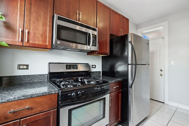 2438 N Hamlin Ave Unit 3D, Chicago, IL 60647 - kitchen featuring appliances with stainless steel finishes and light tile patterned floors