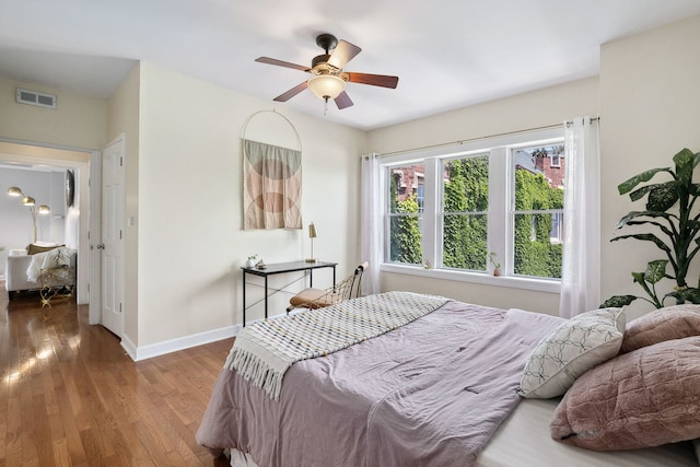 2438 N Hamlin Ave Unit 3D, Chicago, IL 60647 - bedroom featuring wood finished floors and ceiling fan