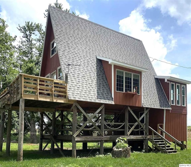 110 E County Rd 150, Warsaw, IL 62379 - back of house with roof with shingles, a deck, and stairway