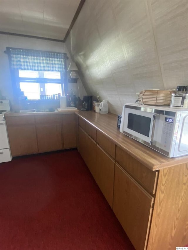 110 E County Rd 150, Warsaw, IL 62379 - kitchen featuring white appliances and vaulted ceiling