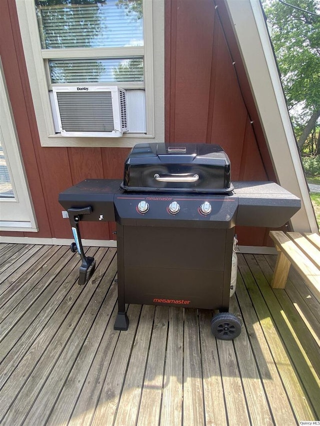 110 E County Rd 150, Warsaw, IL 62379 - wooden terrace featuring area for grilling and cooling unit