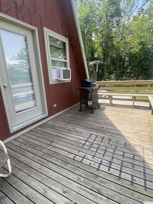 110 E County Rd 150, Warsaw, IL 62379 - wooden terrace featuring a grill, cooling unit, and view of scattered trees