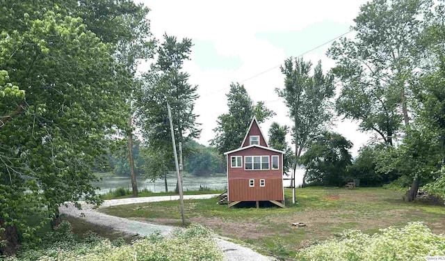 110 E County Rd 150, Warsaw, IL 62379 - view of grassy yard with view of wooded area