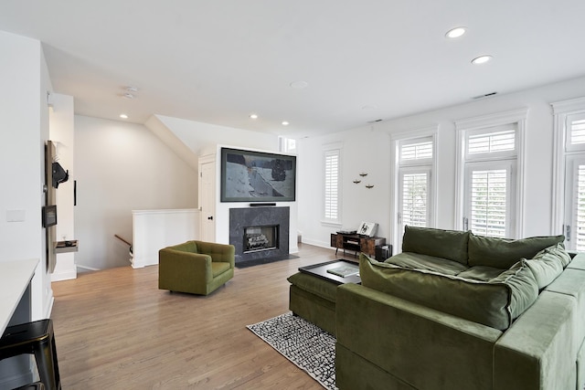 1501 W Diversey Pkwy Unit B, Chicago, IL 60614 - living room with recessed lighting, light wood-type flooring, and a premium fireplace