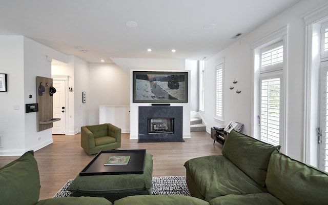 1501 W Diversey Pkwy Unit B, Chicago, IL 60614 - living room featuring wood finished floors, recessed lighting, and a fireplace