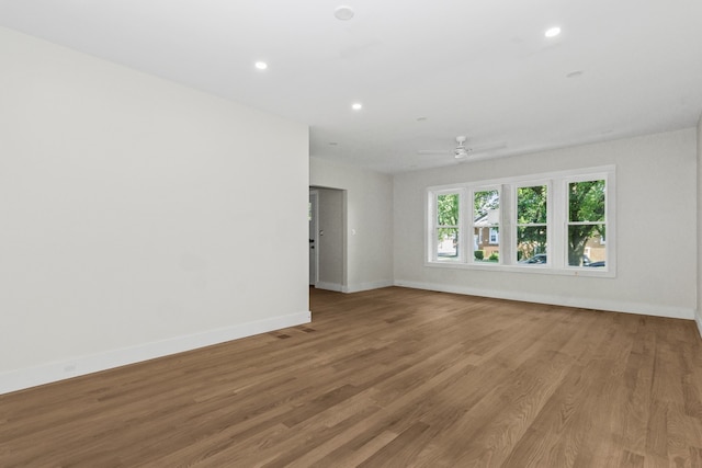 6155 W Cornelia Ave, Chicago, IL 60634 - spare room featuring recessed lighting, light wood-style floors, and ceiling fan