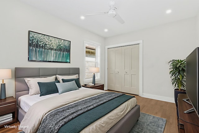 6155 W Cornelia Ave, Chicago, IL 60634 - bedroom with a closet, wood finished floors, a ceiling fan, and recessed lighting