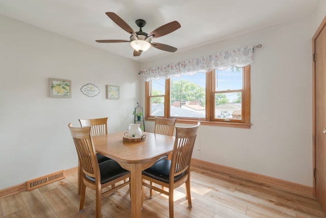 14437 Kostner Ave, Midlothian, IL 60445 - dining room with light wood-style flooring and ceiling fan