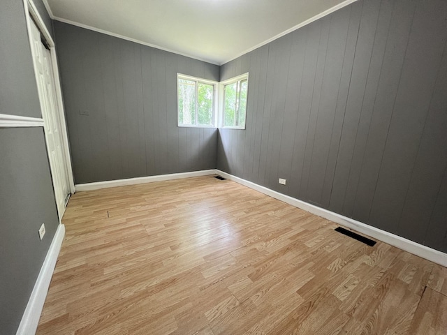 327 Somonauk St, Park Forest, IL 60466 - unfurnished room featuring light wood-style flooring and ornamental molding