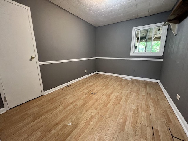 327 Somonauk St, Park Forest, IL 60466 - spare room with wood finished floors and baseboards