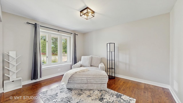 3425 Woodlawn Ave, Gurnee, IL 60031 - living area featuring dark wood-style flooring and baseboards