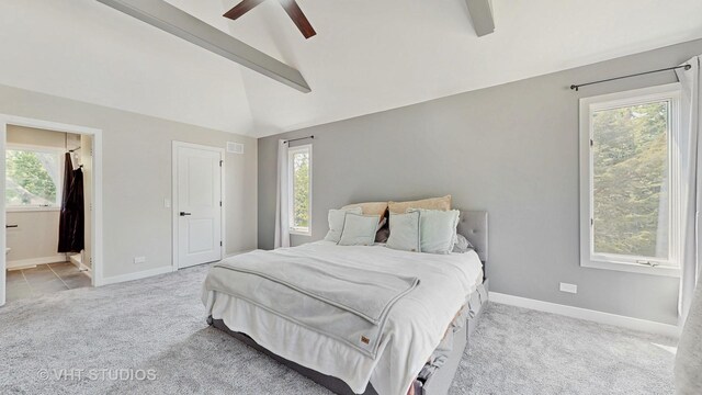 3425 Woodlawn Ave, Gurnee, IL 60031 - bedroom with light colored carpet, multiple windows, lofted ceiling, ensuite bathroom, and a ceiling fan