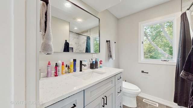 3425 Woodlawn Ave, Gurnee, IL 60031 - full bathroom featuring vanity, plenty of natural light, a shower with curtain, and tile patterned floors