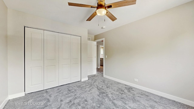 3425 Woodlawn Ave, Gurnee, IL 60031 - unfurnished bedroom featuring carpet flooring, a closet, and ceiling fan