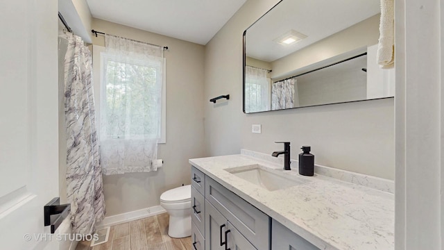 3425 Woodlawn Ave, Gurnee, IL 60031 - bathroom with vanity, wood finished floors, and a shower with shower curtain