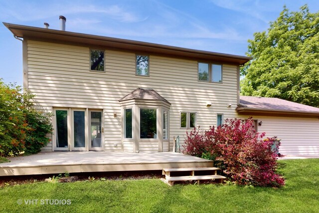 3425 Woodlawn Ave, Gurnee, IL 60031 - back of house with a yard and a wooden deck