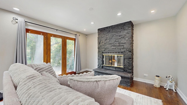 3425 Woodlawn Ave, Gurnee, IL 60031 - living room with wood finished floors, recessed lighting, and a stone fireplace