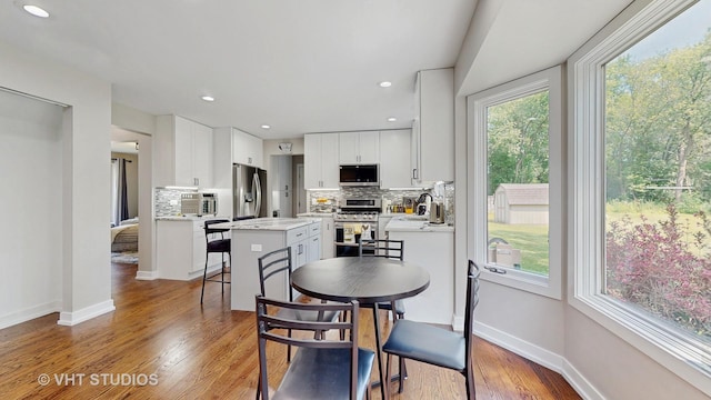 3425 Woodlawn Ave, Gurnee, IL 60031 - dining room featuring light wood-type flooring and recessed lighting