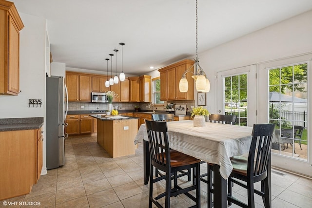 4345 Gladstone Dr, Lake In The Hills, IL 60156 - dining space with light tile patterned flooring
