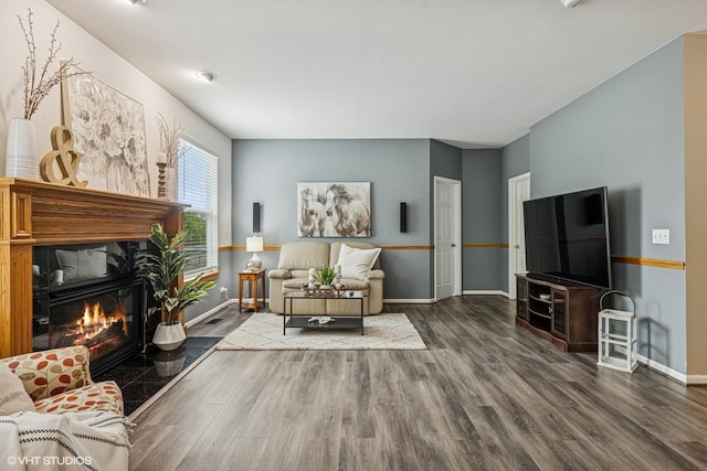 4345 Gladstone Dr, Lake In The Hills, IL 60156 - living area with wood finished floors and a tiled fireplace