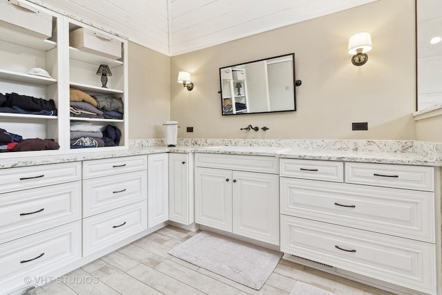 49W695 Hinckley Rd, Big Rock, IL 60511 - full bath featuring vanity, wood tiled floors, and a walk in closet