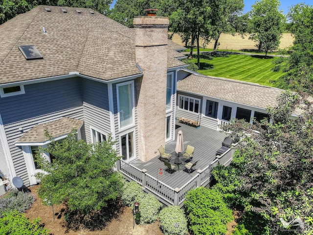 49W695 Hinckley Rd, Big Rock, IL 60511 - back of house featuring a chimney, a shingled roof, and a wooden deck