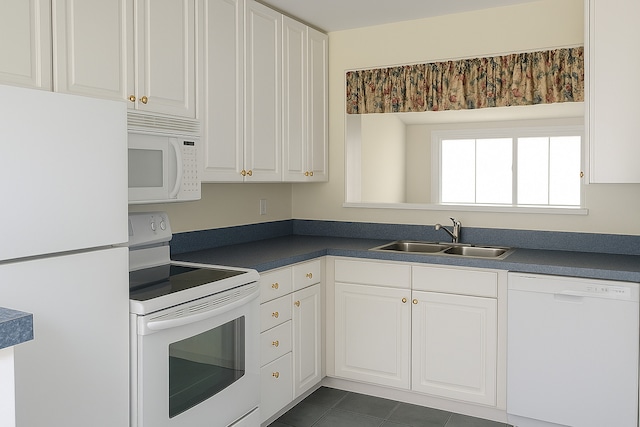 4133 Lindley St, Downers Grove, IL 60515 - kitchen with white appliances, dark countertops, white cabinetry, and dark tile patterned flooring