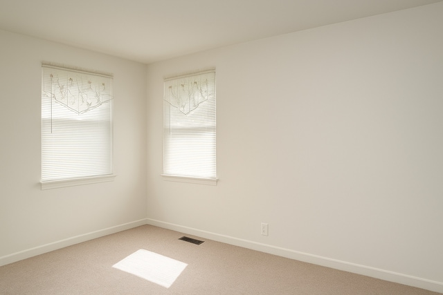 4133 Lindley St, Downers Grove, IL 60515 - empty room featuring light colored carpet and baseboards