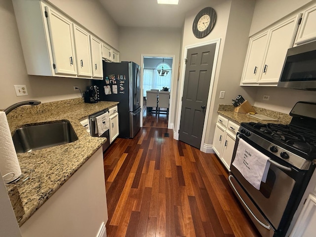1779 Frost Ln, Naperville, IL 60564 - kitchen featuring stainless steel appliances, white cabinets, light stone countertops, and dark wood-style flooring