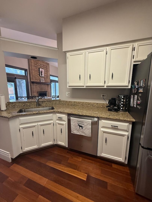 1779 Frost Ln, Naperville, IL 60564 - kitchen featuring stainless steel appliances, white cabinets, and dark wood-style flooring