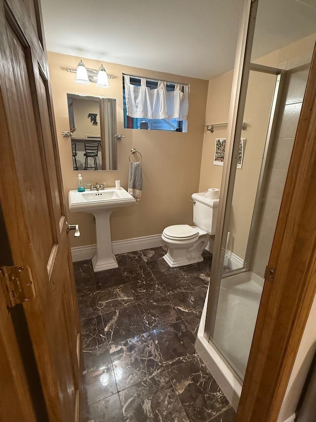 1779 Frost Ln, Naperville, IL 60564 - bathroom with a stall shower and marble look tile flooring