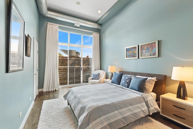 2411 W Walton St Unit 2B, Chicago, IL 60622 - bedroom with dark wood-style flooring and recessed lighting
