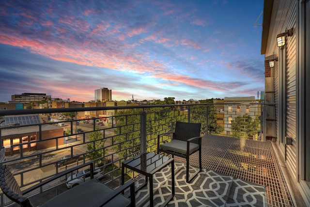 2411 W Walton St Unit 2B, Chicago, IL 60622 - balcony at dusk with a view of city