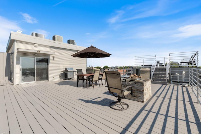 2411 W Walton St Unit 2B, Chicago, IL 60622 - deck featuring outdoor dining space and a grill