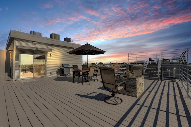 2411 W Walton St Unit 2B, Chicago, IL 60622 - wooden deck featuring outdoor dining area and exterior kitchen