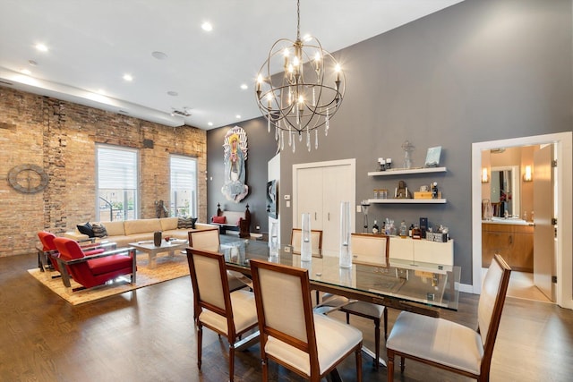 2411 W Walton St Unit 2B, Chicago, IL 60622 - dining space featuring a towering ceiling, wood finished floors, a chandelier, and recessed lighting