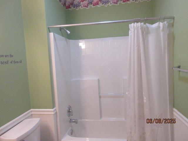 13005 Big Horn Dr, Huntley, IL 60142 - bathroom with shower / bathtub combination with curtain and toilet