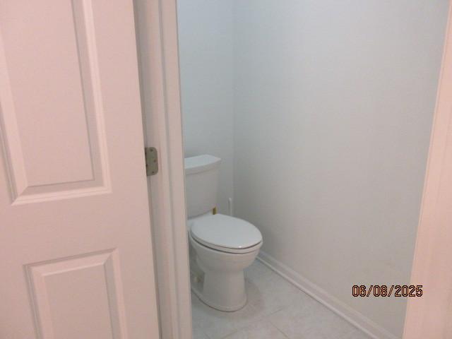 13005 Big Horn Dr, Huntley, IL 60142 - bathroom with tile patterned floors and toilet