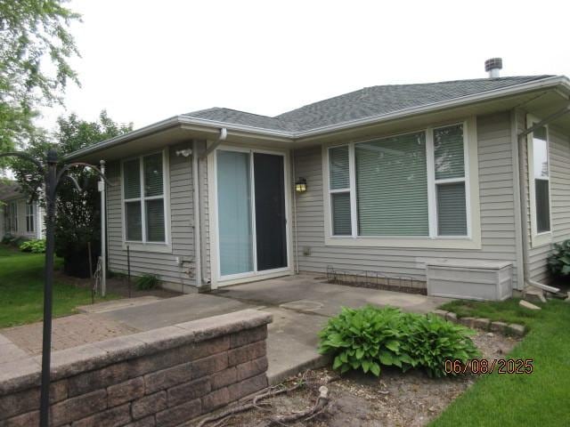 13005 Big Horn Dr, Huntley, IL 60142 - view of front of house with a patio area