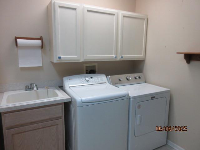 13005 Big Horn Dr, Huntley, IL 60142 - washroom with cabinet space and separate washer and dryer