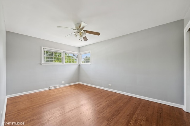 1419 W Miner St, Arlington Heights, IL 60005 - spare room with ceiling fan and wood finished floors