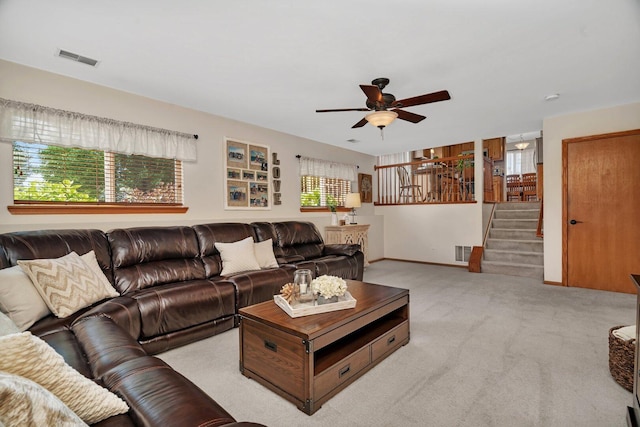 512 Creekside Cir, Minooka, IL 60447 - living area featuring ceiling fan, stairs, and carpet floors