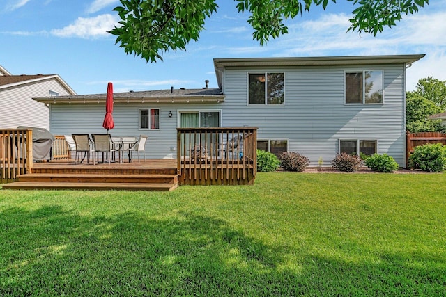 512 Creekside Cir, Minooka, IL 60447 - rear view of house featuring a wooden deck and a yard