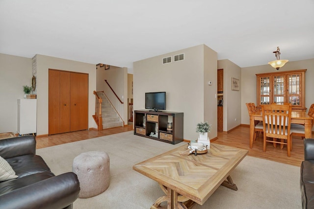512 Creekside Cir, Minooka, IL 60447 - living room with light wood-type flooring and stairs