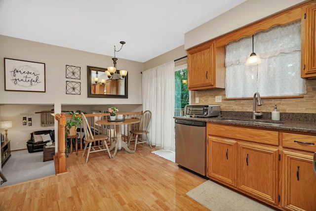 512 Creekside Cir, Minooka, IL 60447 - kitchen with dishwasher, light wood finished floors, tasteful backsplash, and dark countertops