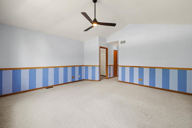 314 Spring Creek Cir, Schaumburg, IL 60173 - carpeted empty room featuring vaulted ceiling, ceiling fan, and wallpapered walls