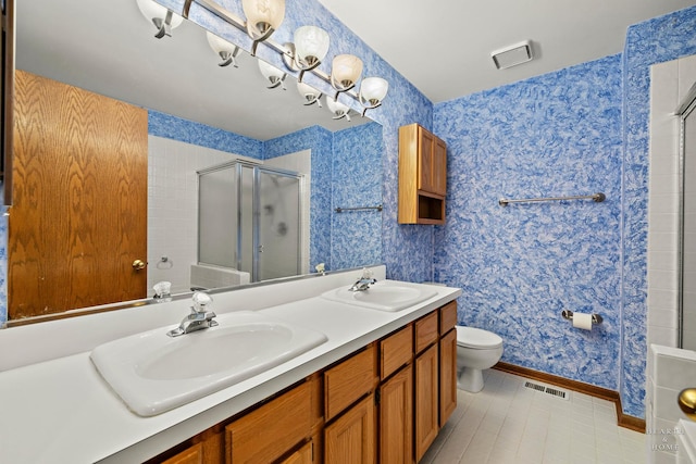 314 Spring Creek Cir, Schaumburg, IL 60173 - bathroom with a shower with door, double vanity, tile patterned floors, and wallpapered walls