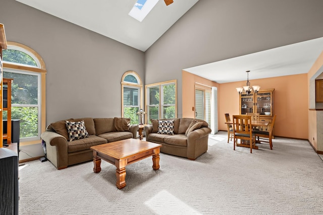 314 Spring Creek Cir, Schaumburg, IL 60173 - living area with a chandelier, high vaulted ceiling, light carpet, and a skylight